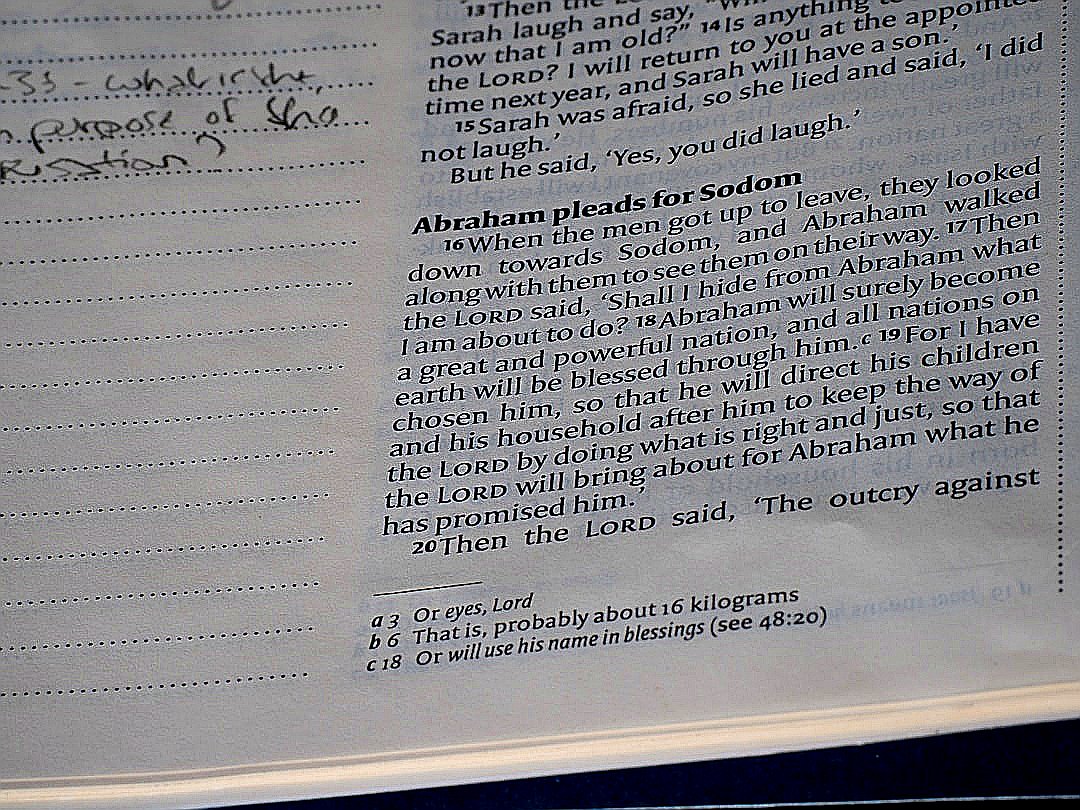 Page of text with handwritten notes