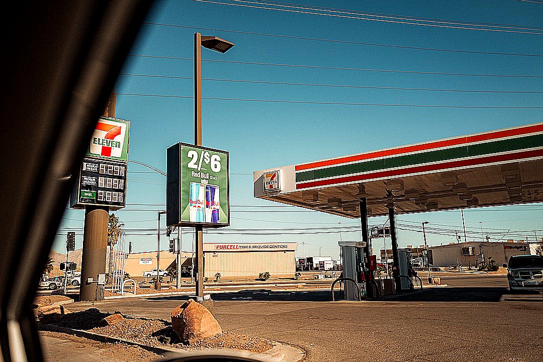 a gas station with a sign for a gas station
