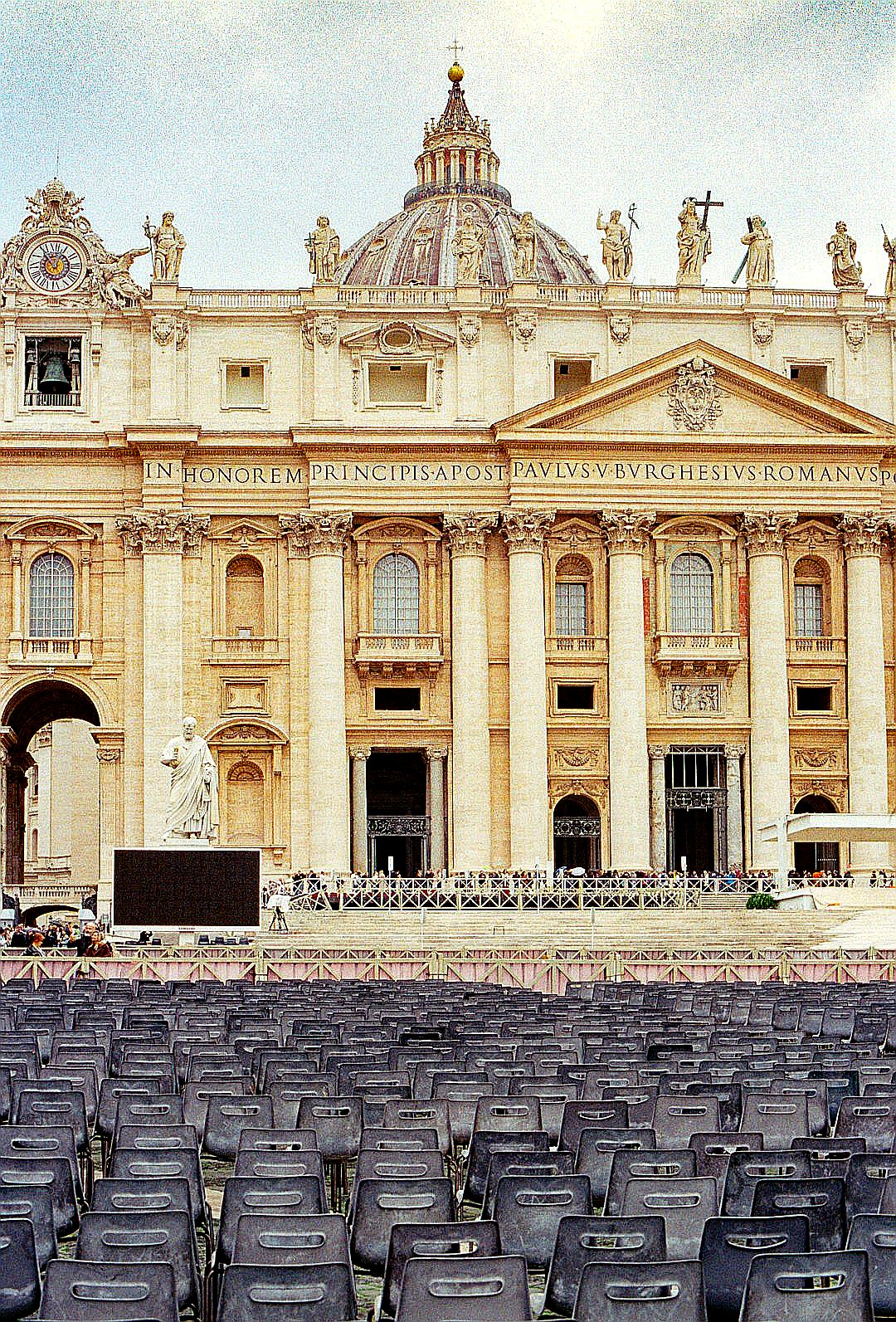 Rows of empty chairs in front of st. peter's basilica