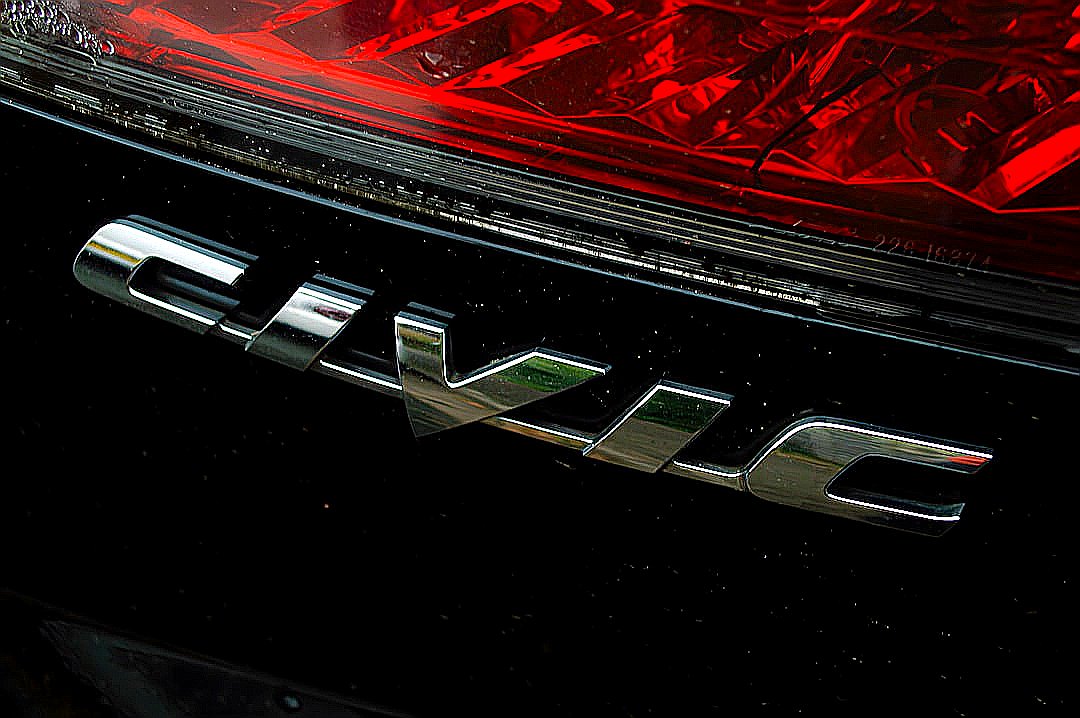 A close up of the tail light of a car
