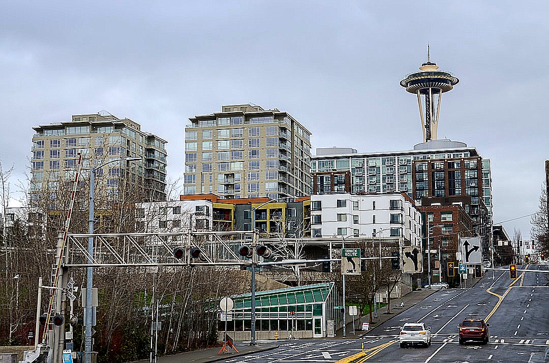 City skyline with space needle and modern buildings