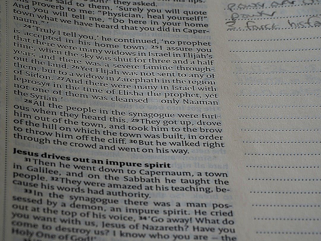 A close up of a book with writing on it