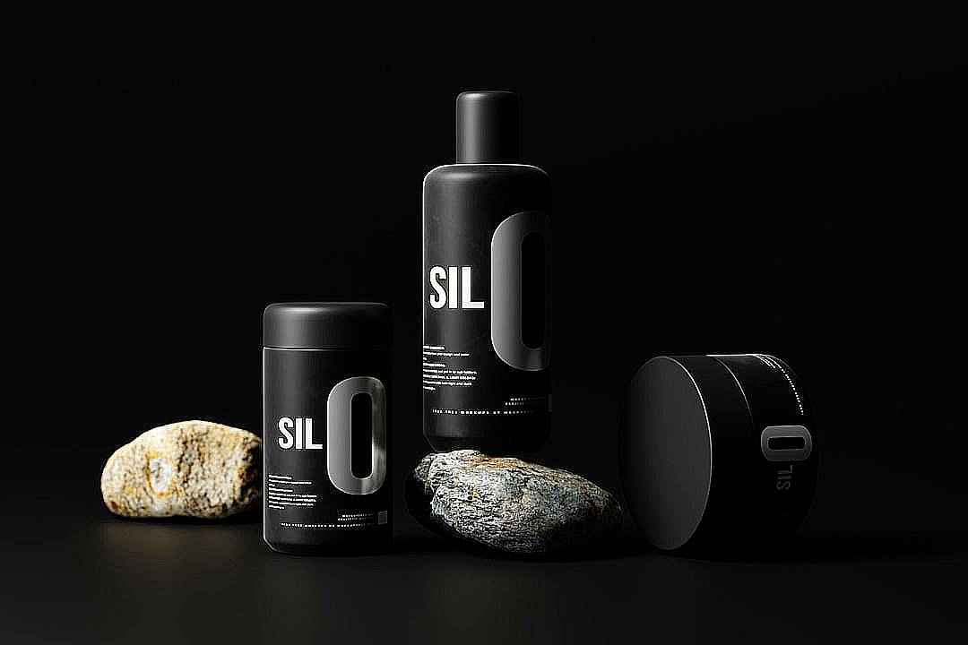 a couple of bottles that are next to some rocks