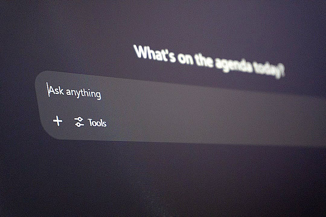 Digital interface with "ask anything" prompt.