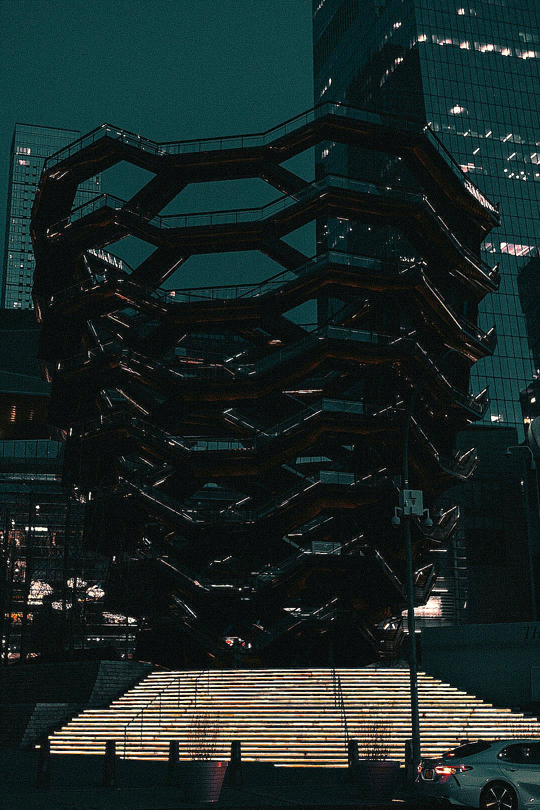 black and gray glass building during night time
