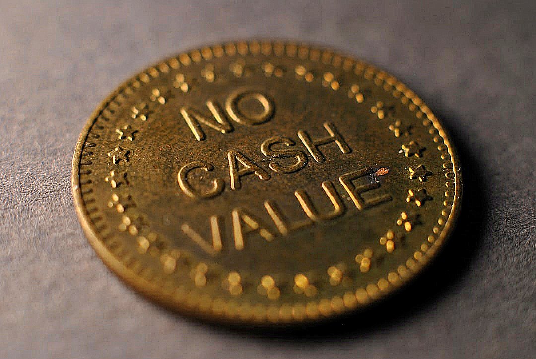 A close up of a coin on a table