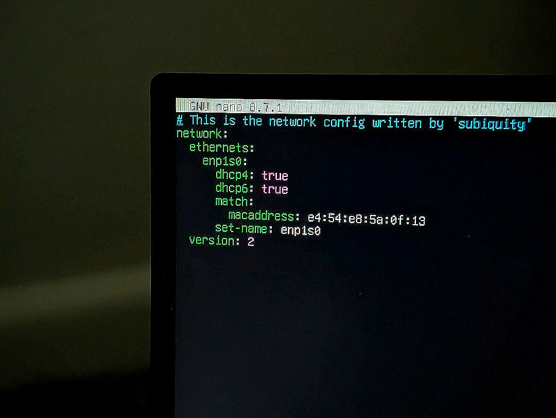 A computer screen displaying network configuration code in a terminal window